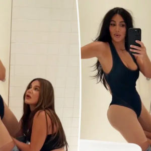 Kim Kardashian struggles to close her bodysuit and enlists sister Khloe’s help with the wardrobe crisis in hilarious bathroom video: ‘This is what sisters do’