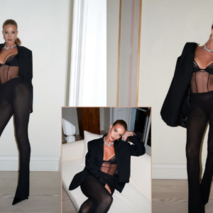 Rosie Huntington-Whiteley slips into a racy mesh jumpsuit