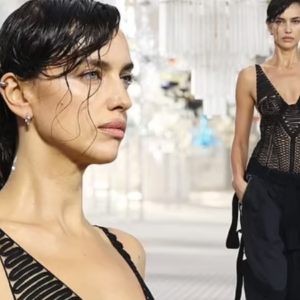 Irina Shayk puts on a daring display in a sheer mesh bodysuit as she walks the runway for Attico at Milan Fashion Week Irina Shayk puts on a daring display in a sheer mesh bodysuit as she walks the runway for Attico at Milan Fashion Week