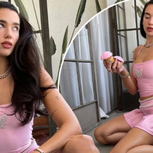 Dua Lipa gets into the Wimbledon spirit in a pink tank top and matching tennis skirt as she poses with a racket and balls Dua Lipa gets into the Wimbledon spirit in a pink tank top and matching tennis skirt as she poses with a racket and balls