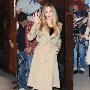 Angelina Jolie looks chic in trench coat and black dress at Director’s Guild as Maria film racks up Oscar buzz