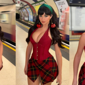 Demi Rose showcases her ample curves in a revealing red corset dress for sultry pH๏τoshoot