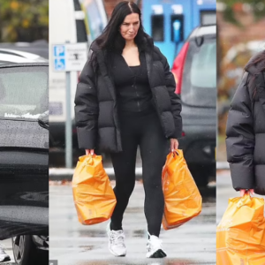 Annie Kilner continues to go without her wedding ring as she tucks into a cookie after food shop amid divorce battle with husband Kyle Walker